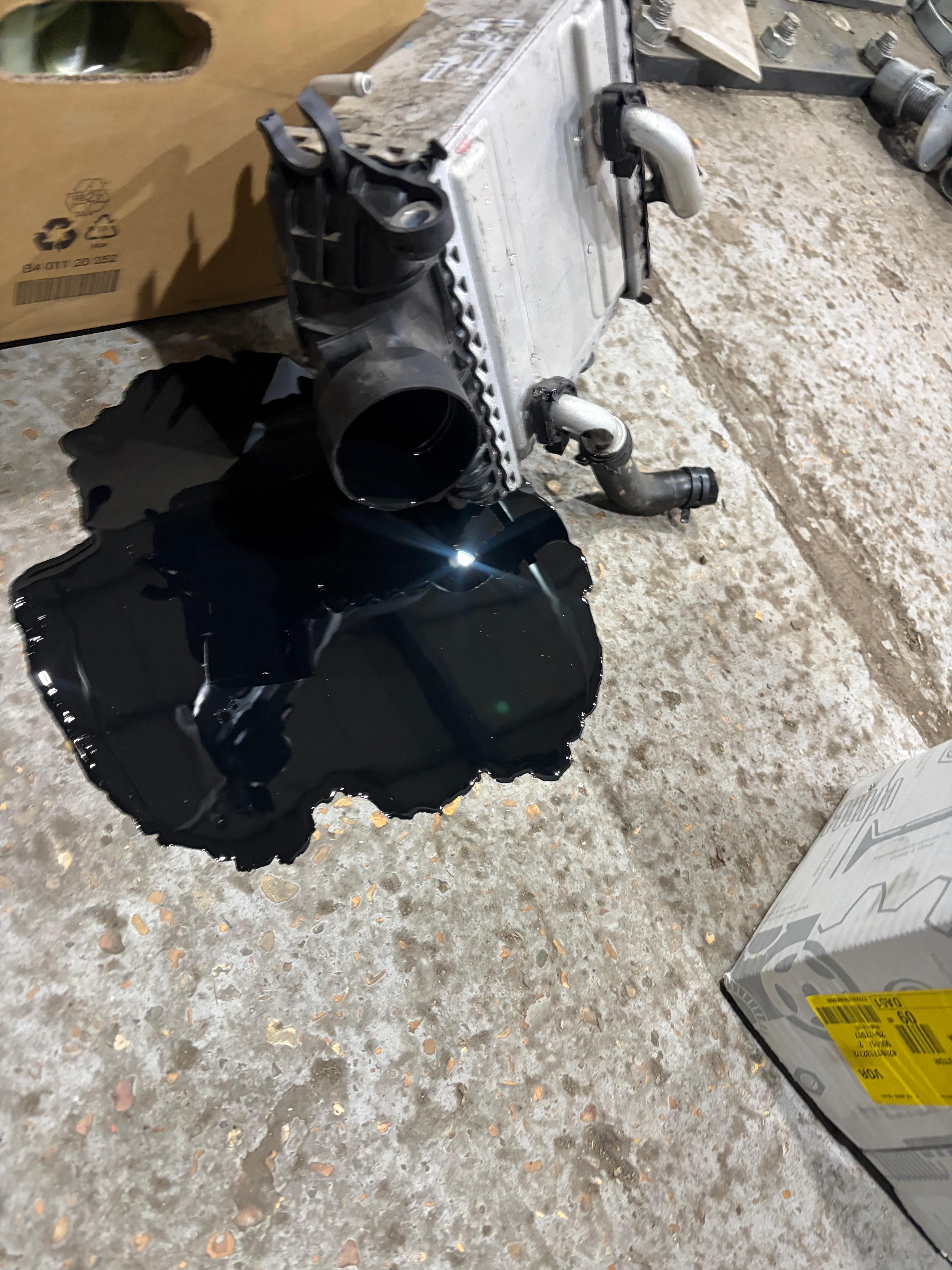 Engine oil pouring out of OM654 charge air cooler showing turbo seal failure