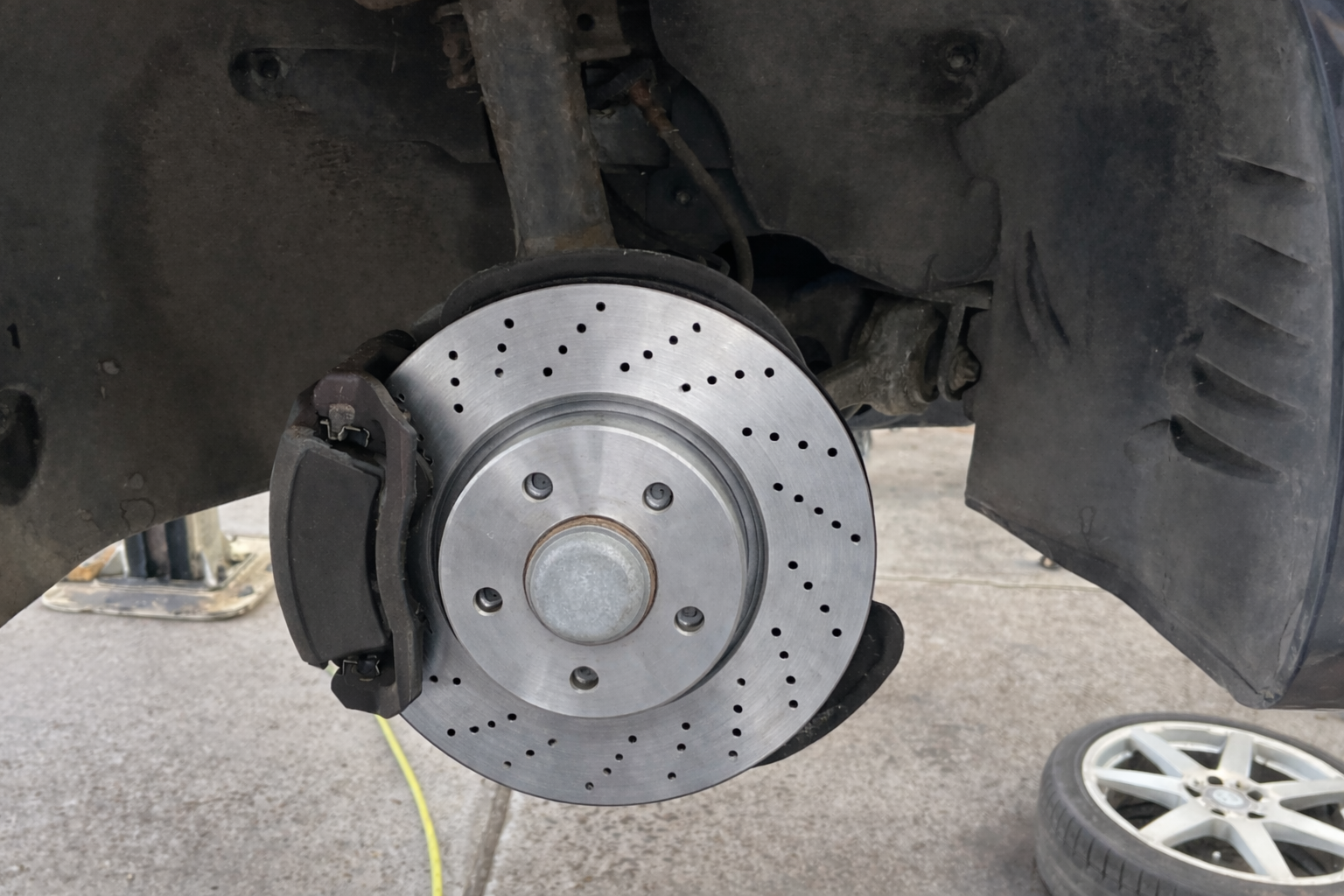 Completed front brake assembly with new pads and discs on Mercedes Sprinter