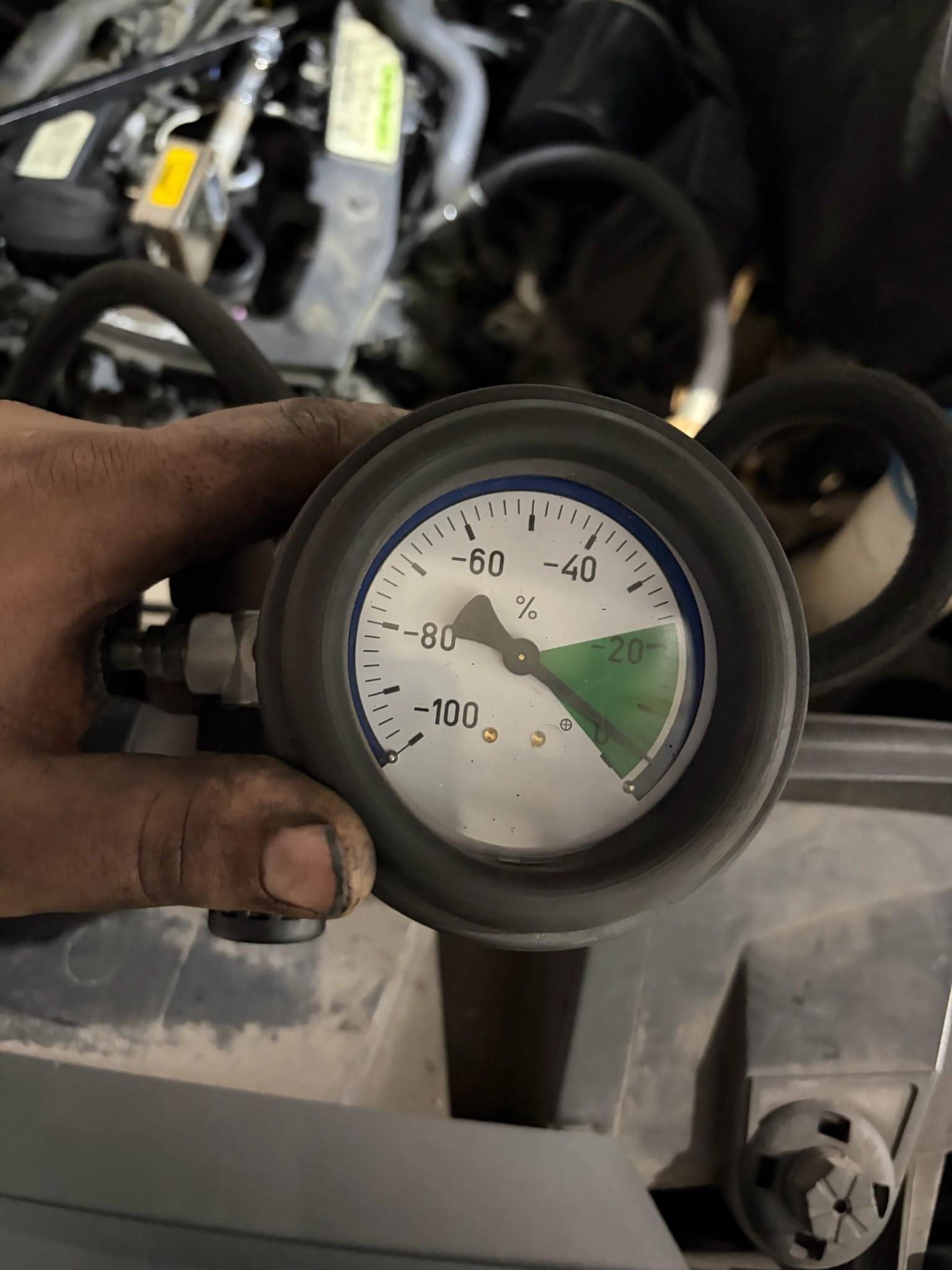 Vacuum gauge testing on Mercedes engine bay