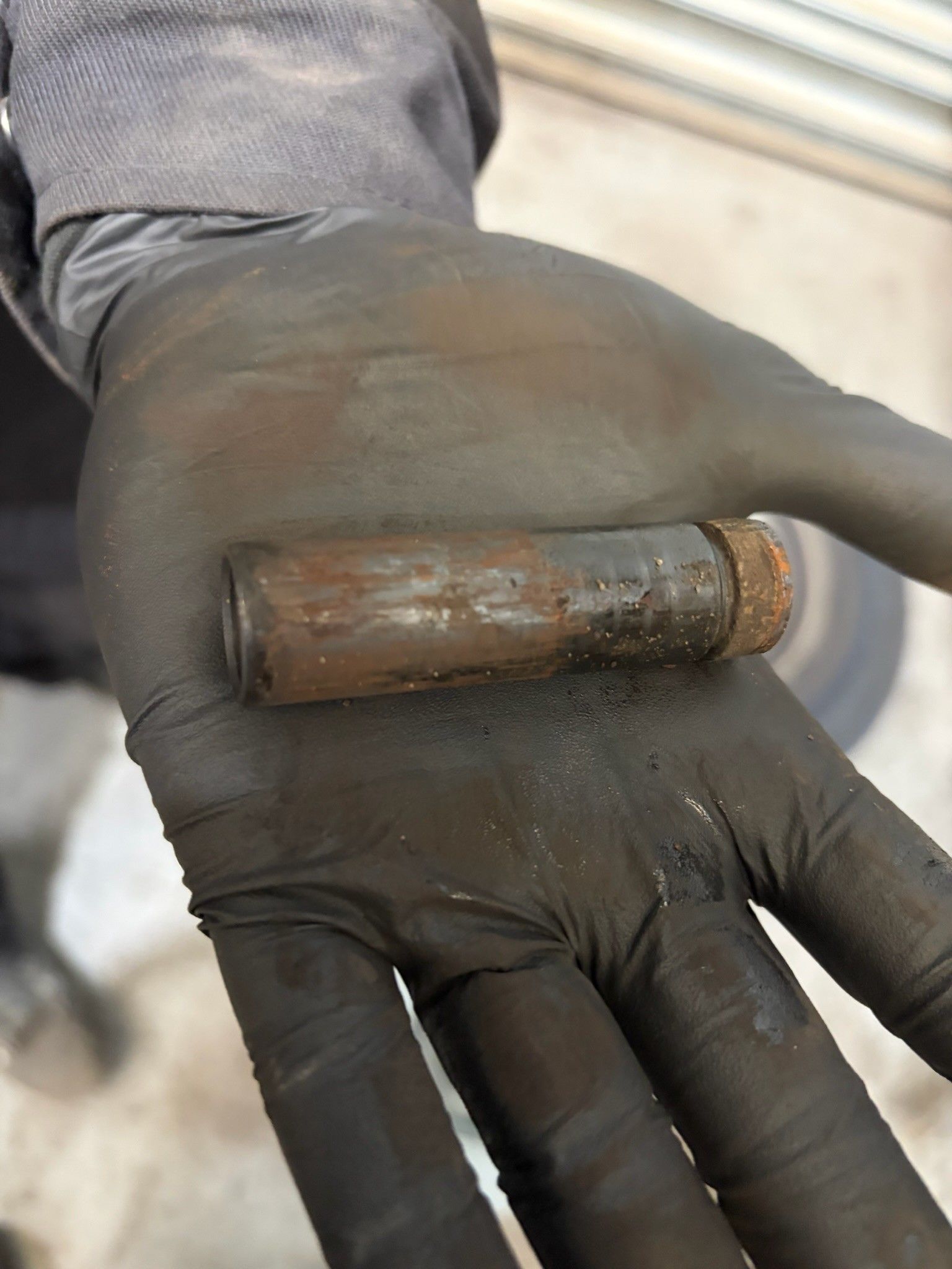 Seized corroded slide pin removed from brake assembly