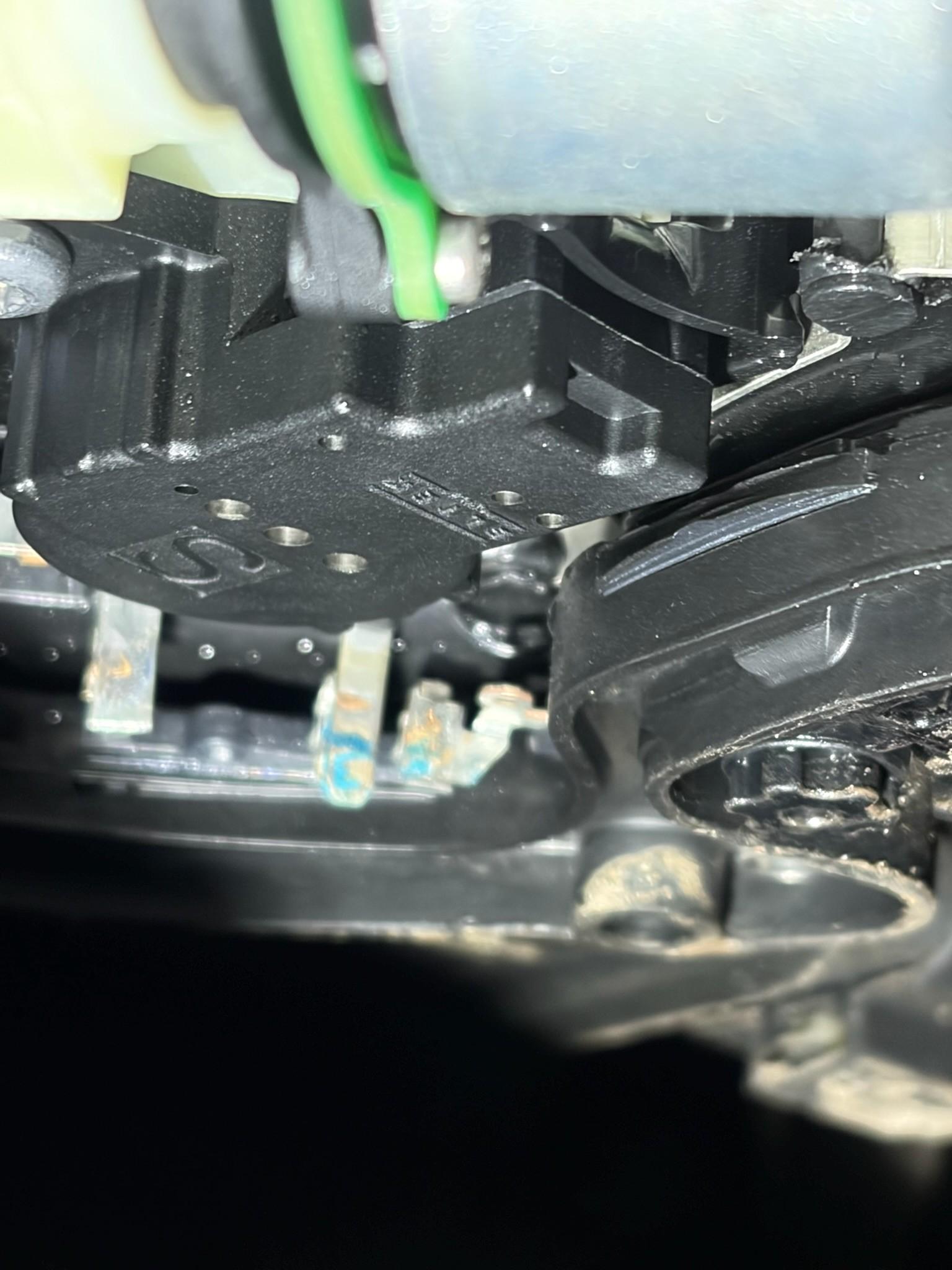 Corroded sensor pins with moisture damage in connector
