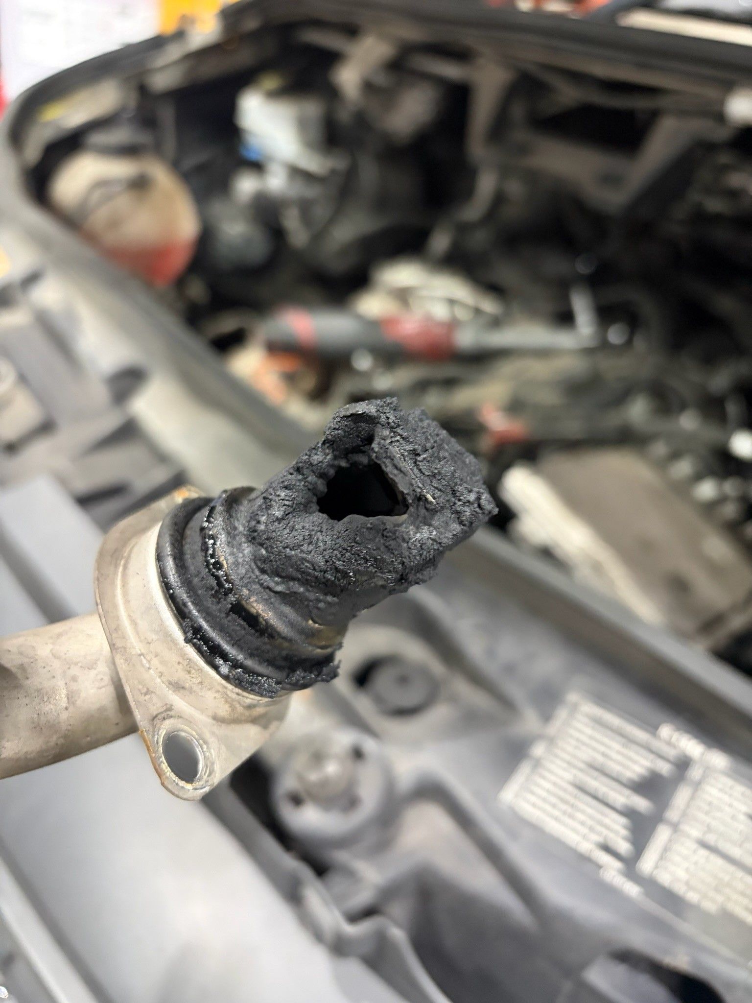 Carbon-clogged MAP sensor from Sprinter engine bay