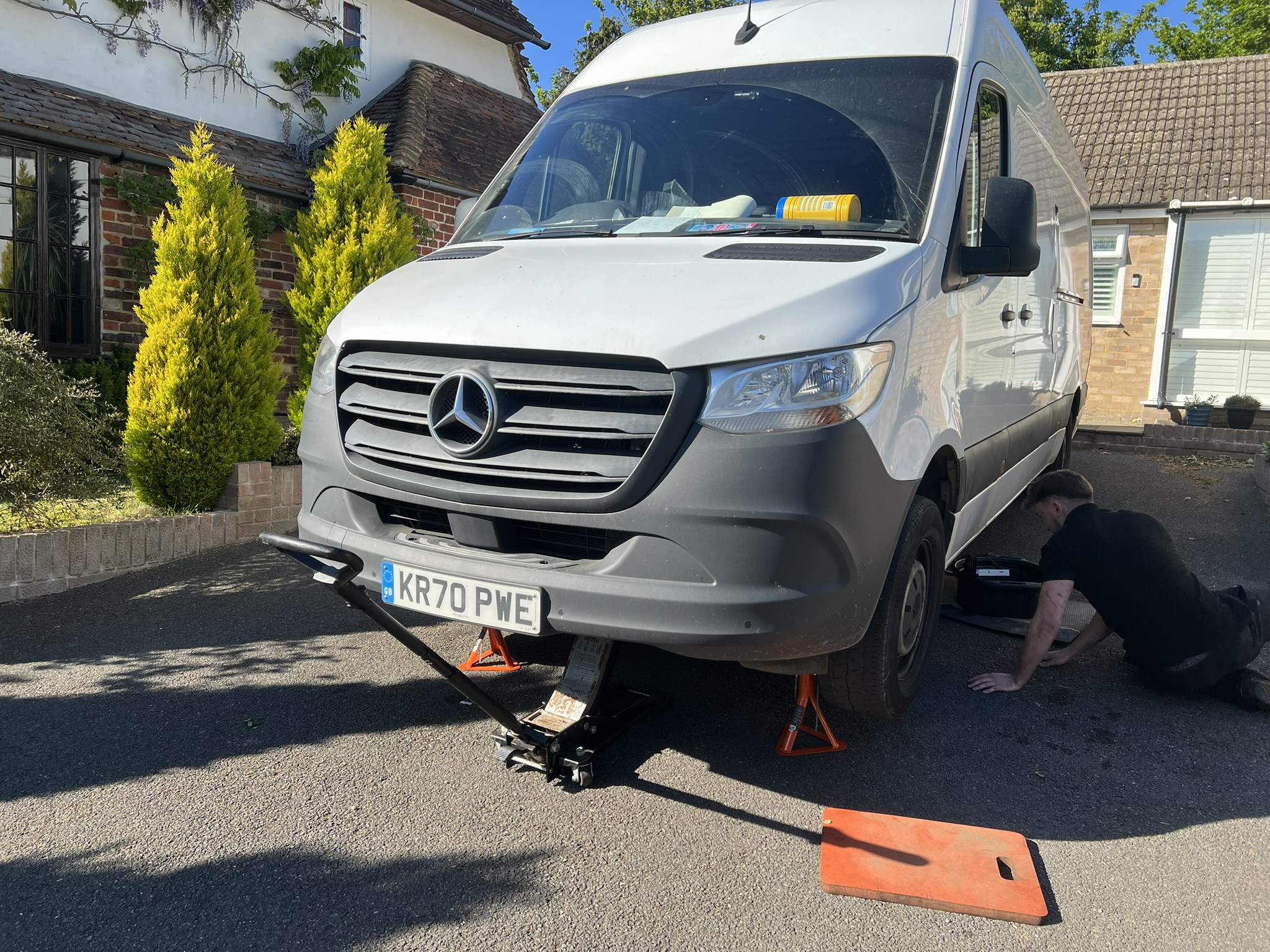 Mercedes van safely jacked up for mobile servicing